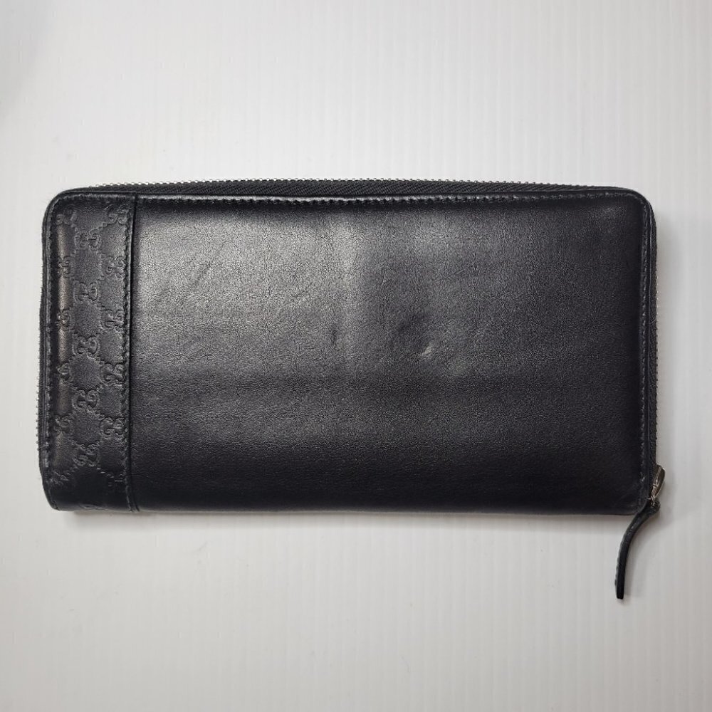 GUCCI embossed leather logo zip around long wallet black